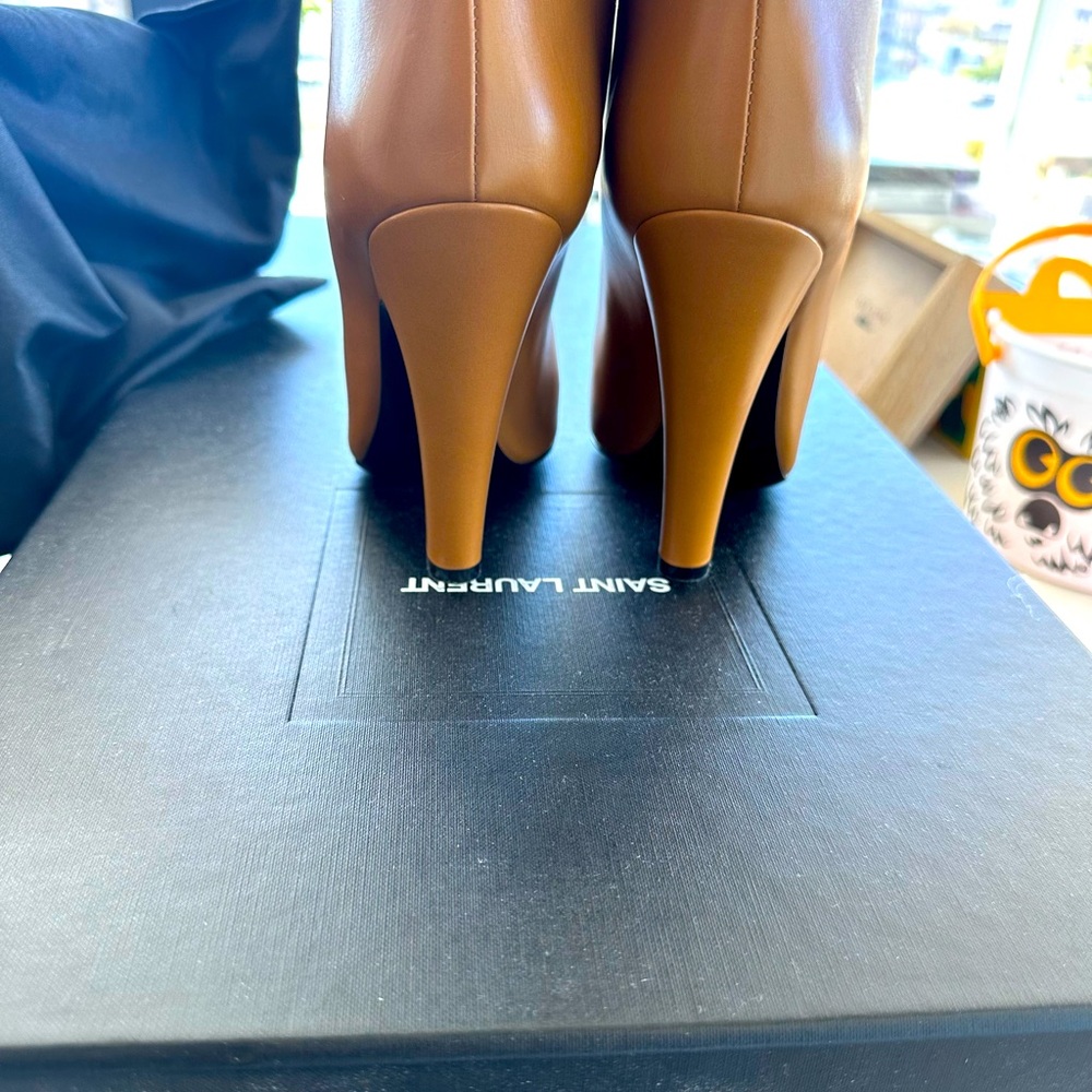Saint Laurent boots are definitely a show stopper size 38.